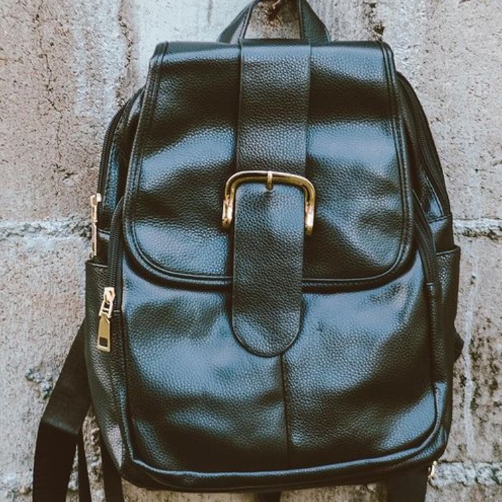 NWOT Black backpack purse with brass accents